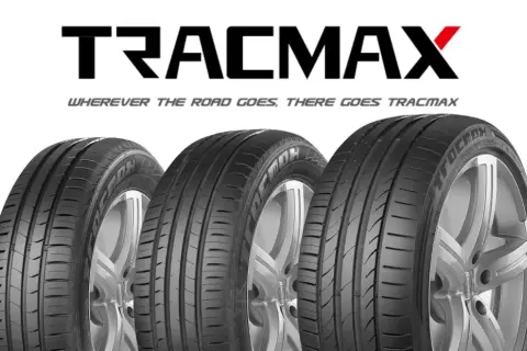Trois pneus Tracmax sur fond blanc. Le logo Tracmax est visible en haut, avec le slogan "Wherever the road goes, there goes Tracmax".