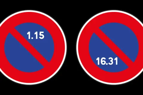 Panneaux de stationnement alterné : interdiction de stationner du 1er au 15 du mois d'un côté, et du 16 à la fin du mois de l'autre.