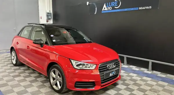 Audi A1 1.0 TFSI 95, une voiture réputée pour sa fiabilité. Cette citadine rouge vif avec toit noir est prête pour de nouvelles aventures.